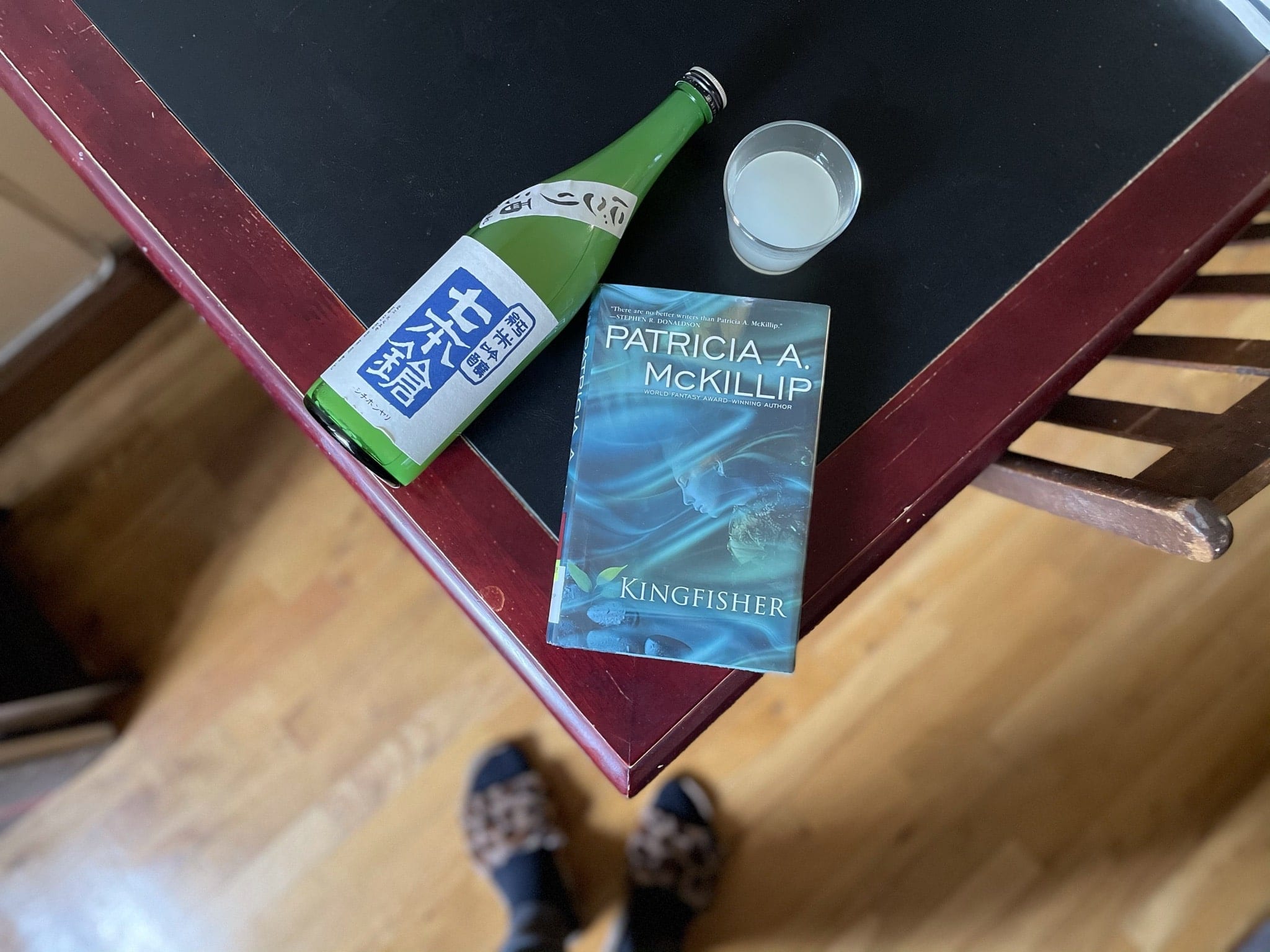 Sake Shichi Hon Yari Junmai Ginjo with book, reading, pairing